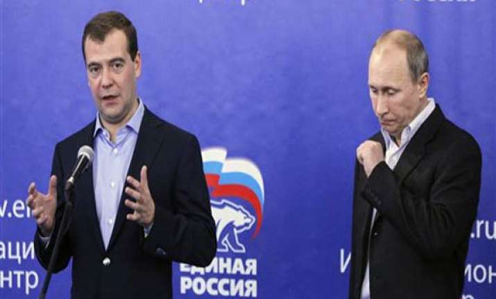 putin s party barely hangs on to its majority