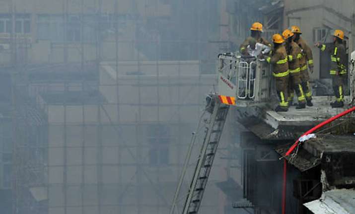 firefighters battle deadly blaze in market