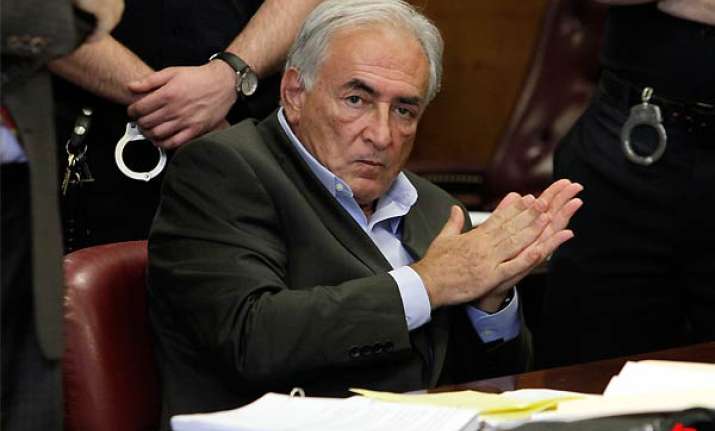 former imf chief granted bail ordered home detention