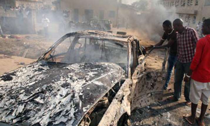 four bombers dead as blasts rock nigerian city