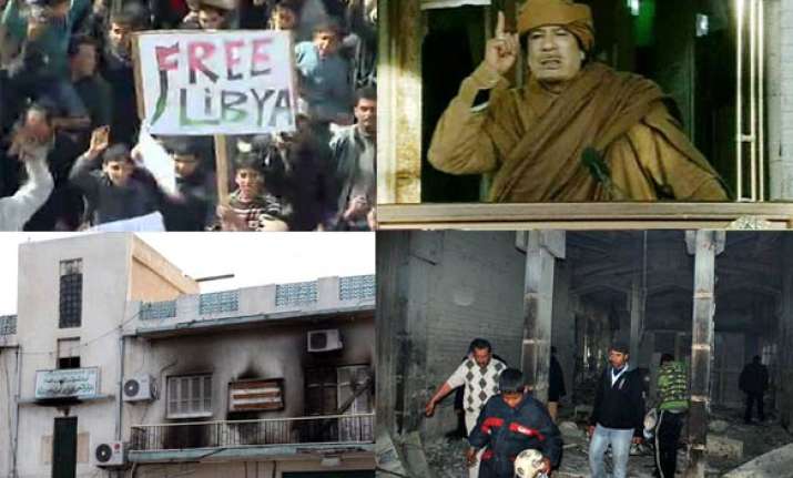 gaddafi holds out in tripoli as opposition captures cities