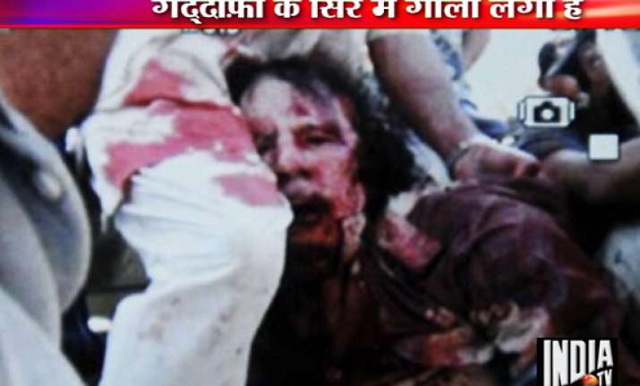 gaddafi killed libya explodes into celebrations