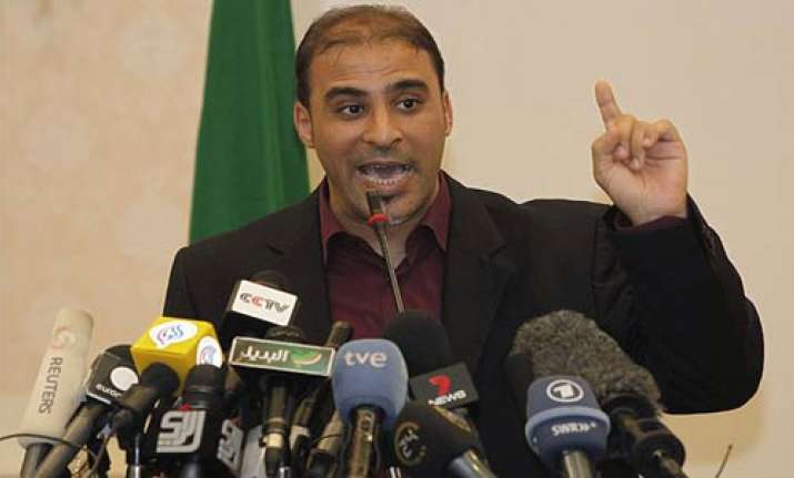 gaddafi safe and his morale high spokesman