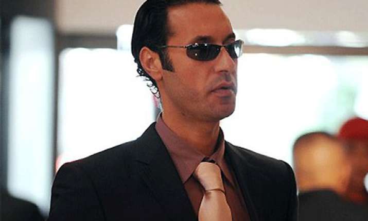 gaddafi son held as libya fighters mop up resistance