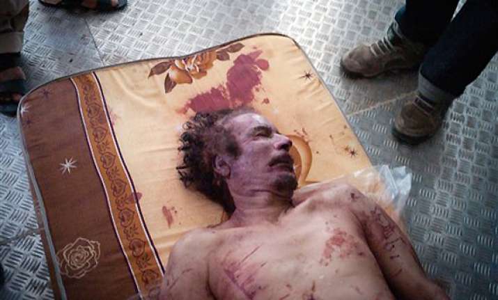 gaddafi unburied libyans manoeuvre for new era