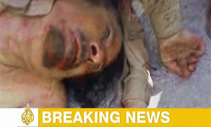 gaddafi s body was kicked around on streets of sirte died