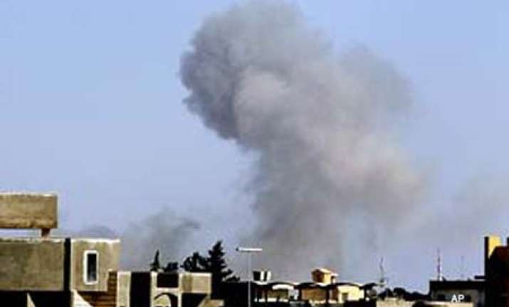 gaddafi s forces continue assault