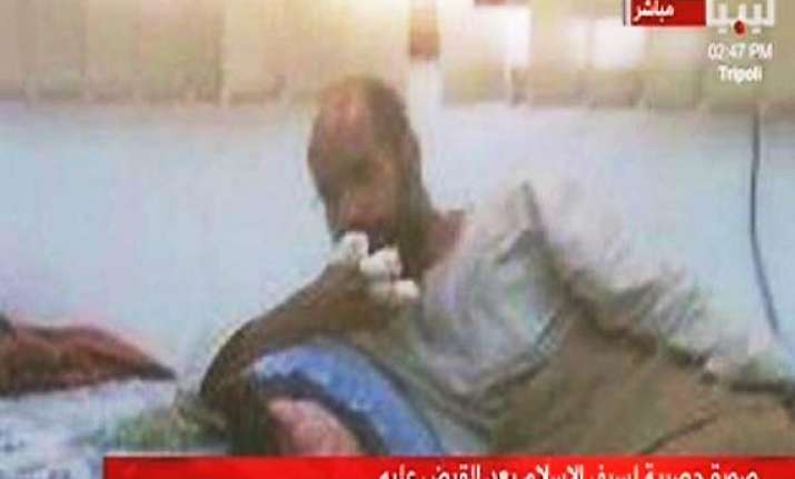 gaddafi s son seif arrested says ntc justice minister