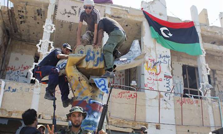 gadhafi spokesman libyan leader leading the fight