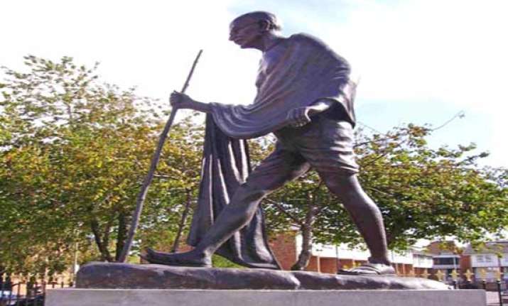 gandhi statue vandalised amid sikh protests over operation