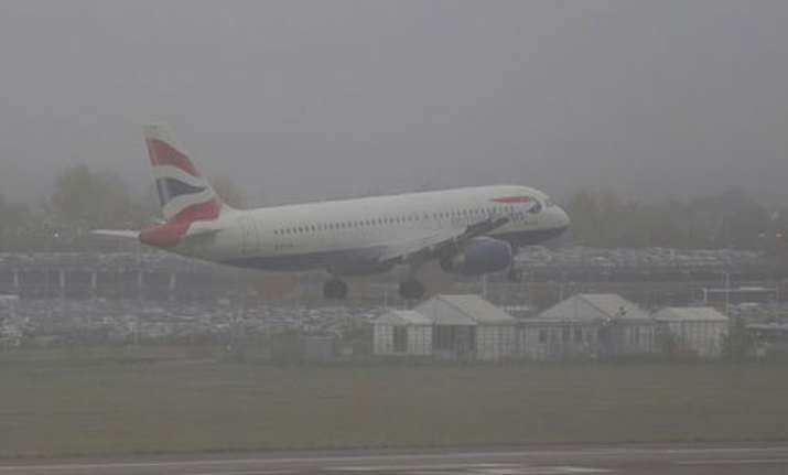 heathrow airport cancels 60 flights due to fog