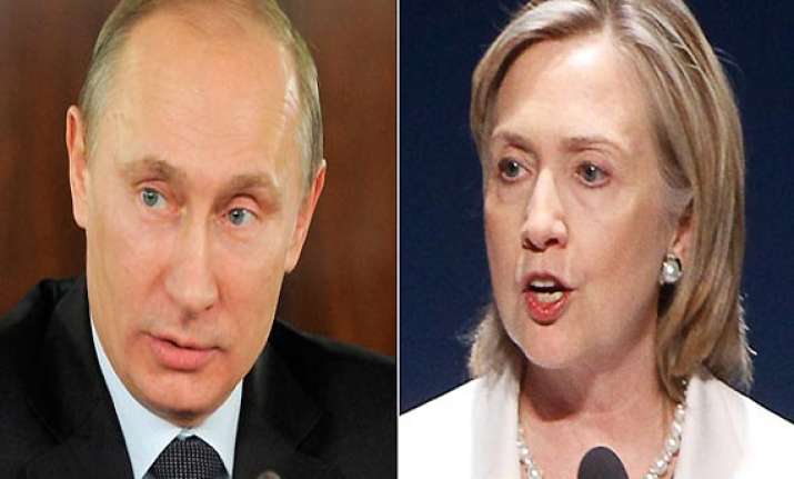 hillary clinton again blasts putin compares him to hitler