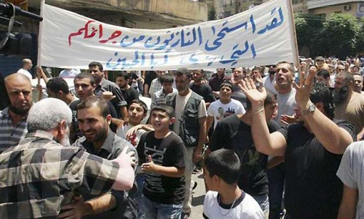 huge protests grip syria 6 killed in clashes