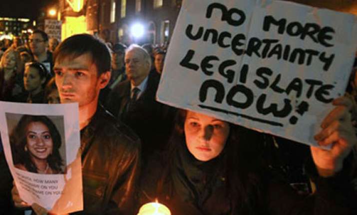hundreds hold protest march outside irish parliament over