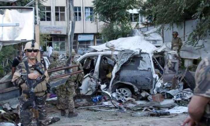 afghan car bombing kills at least 12 including 3 americans