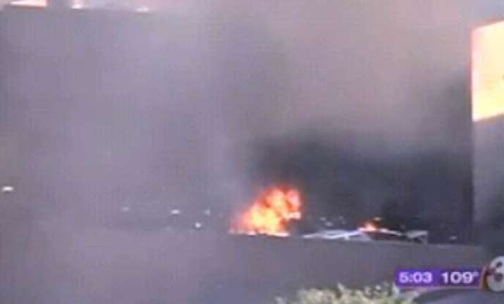 plane crashes into building at phoenix airport in us