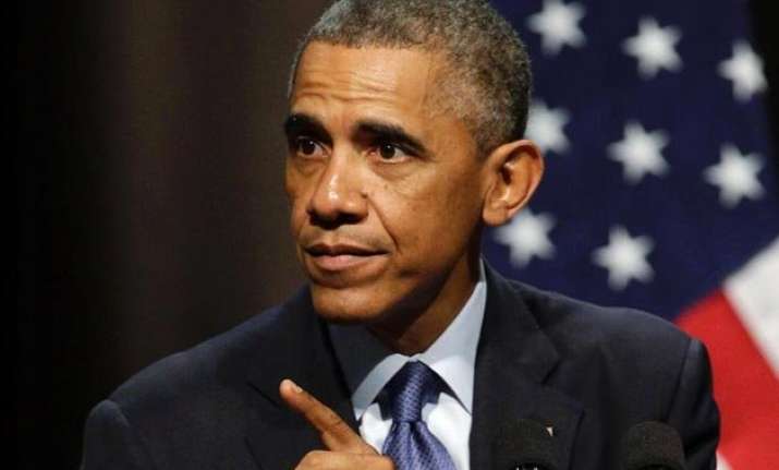 barack obama signs bill allowing congress to review iran s