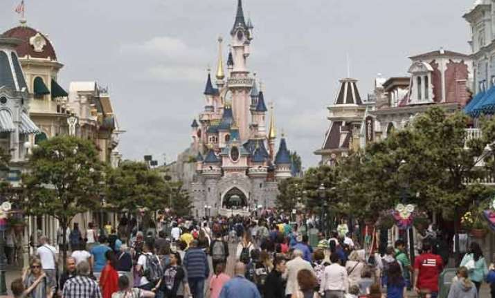 man with 2 handguns partner arrested at disneyland paris