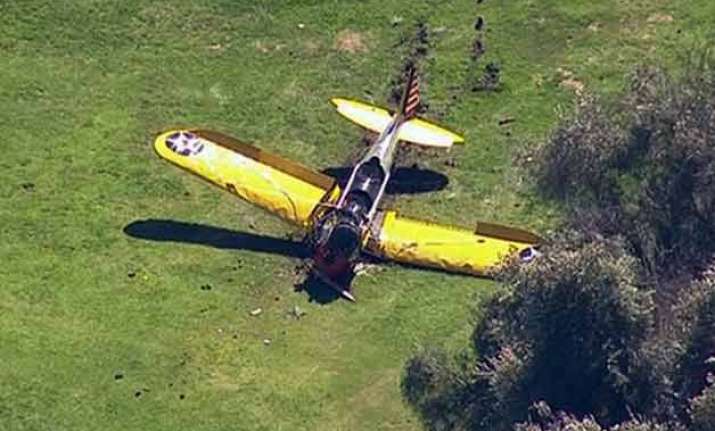 harrison ford crash lands plane on golf course