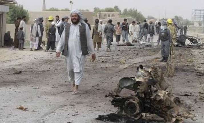 afghan police suicide bomber kills 9 in northwest