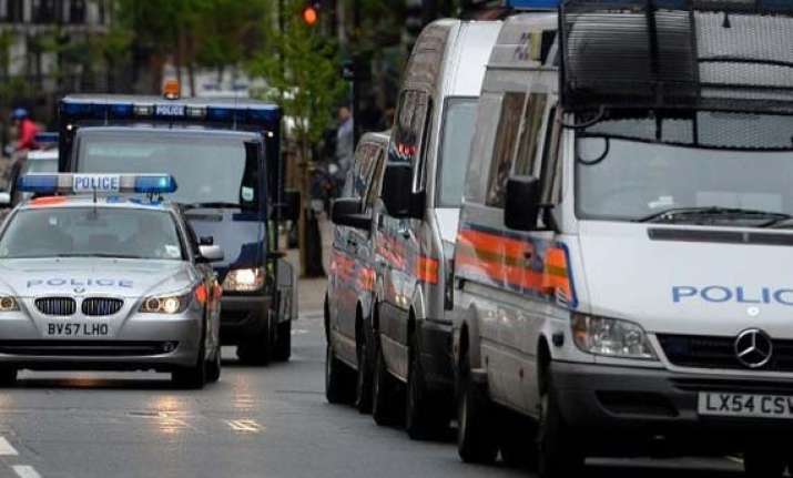 british police charge four with is linked terror plot