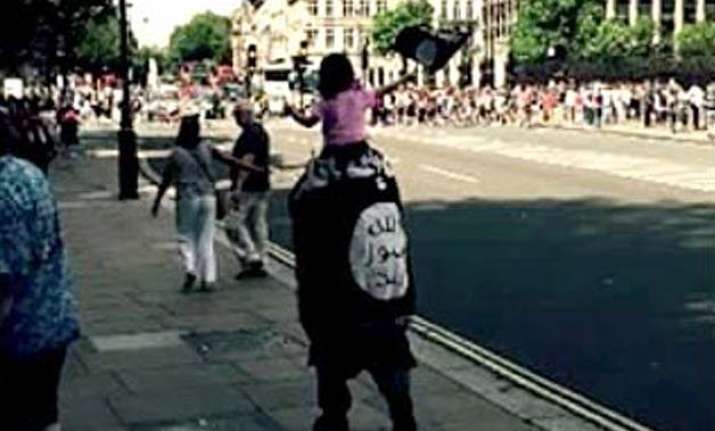man girl spotted parading outside uk parliament with is flag