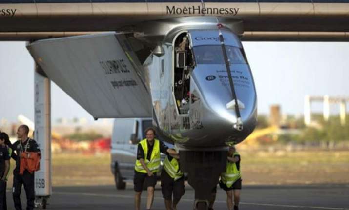 round the world solar plane suspends flight
