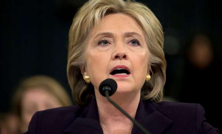hillary clinton defends herself on benghazi as gop probes