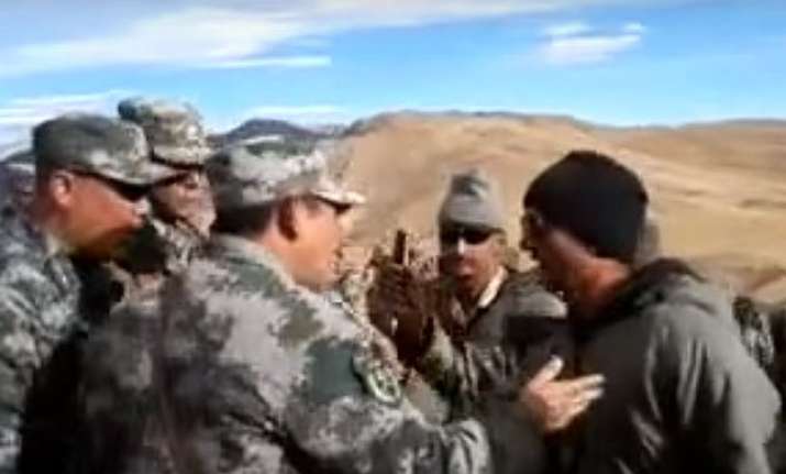 china plays down indian border standoff watch video