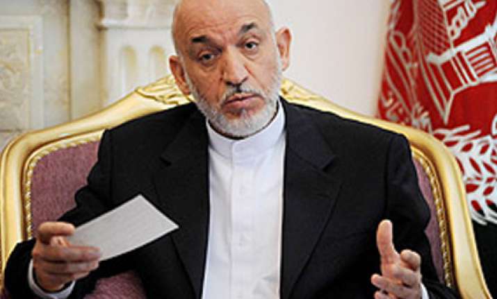 karzai confirms holding talks with taliban