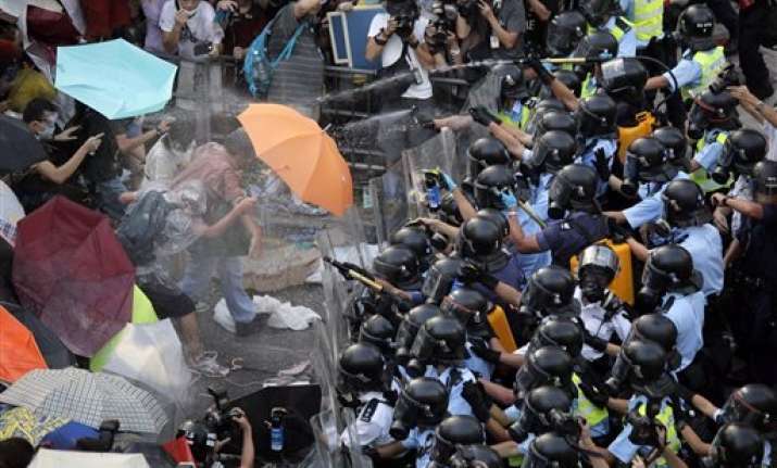 under fire hong kong leader marks national day