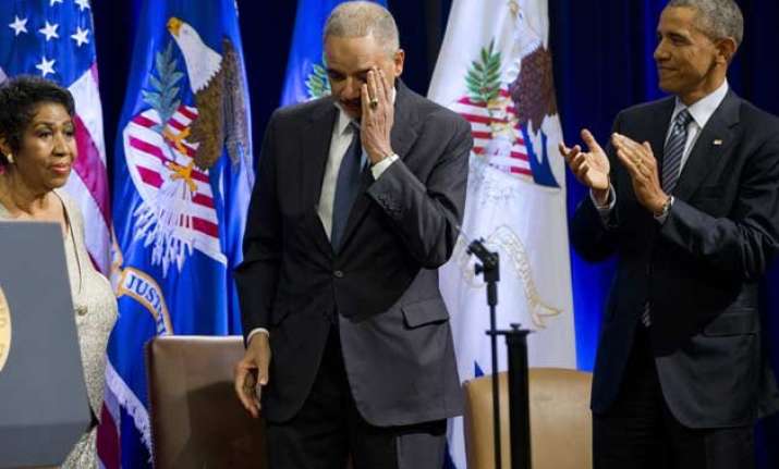 barack obama bids farewell again to attorney general eric