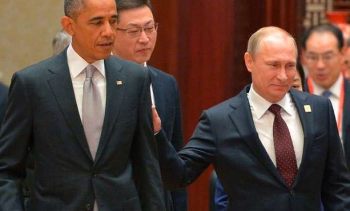 vladimir putin congratulates barack obama calls for talks