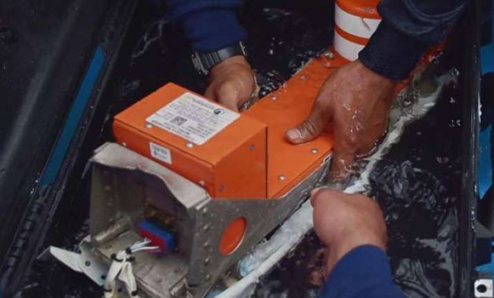 search continues as experts probe airasia jet s black boxes