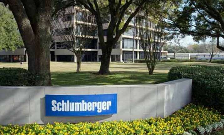 us fines oil giant for doing business with iran sudan