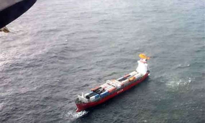 container ship towed away from canadian coast
