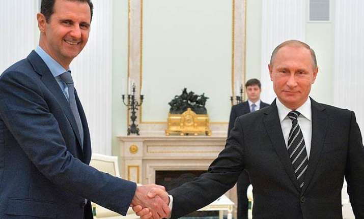 syrian president assad travels to moscow meets putin