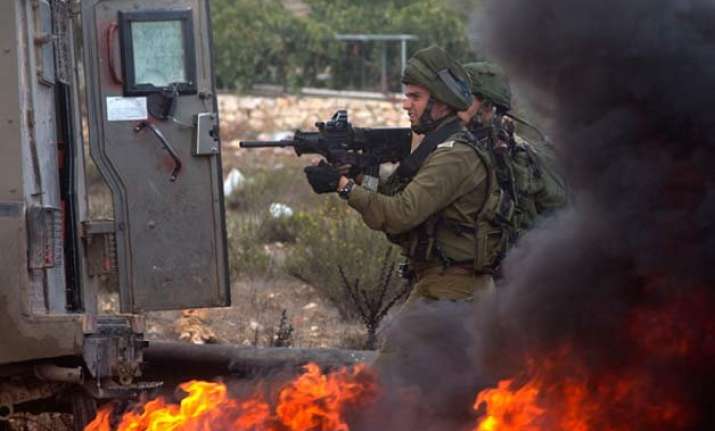 violence spreads to gaza israeli troops kill 6 palestinians