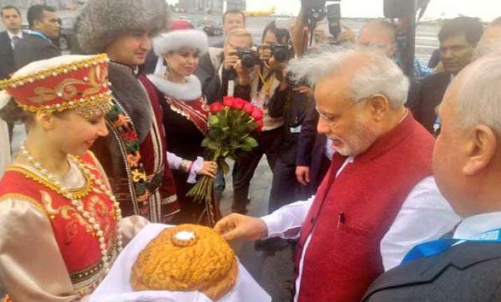 pm modi arrives in russia to attend brics sco summits