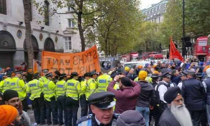 20 held as sikh protest at indian embassy in british goes