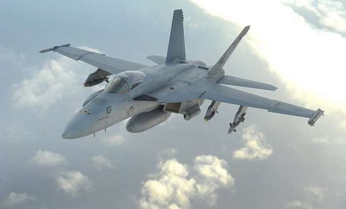 australia launches first air strike on is