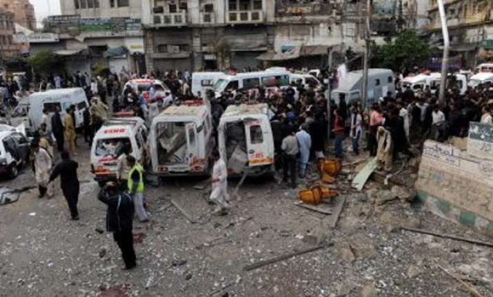 suicide bombing at shiite procession kills 20 in pakistan