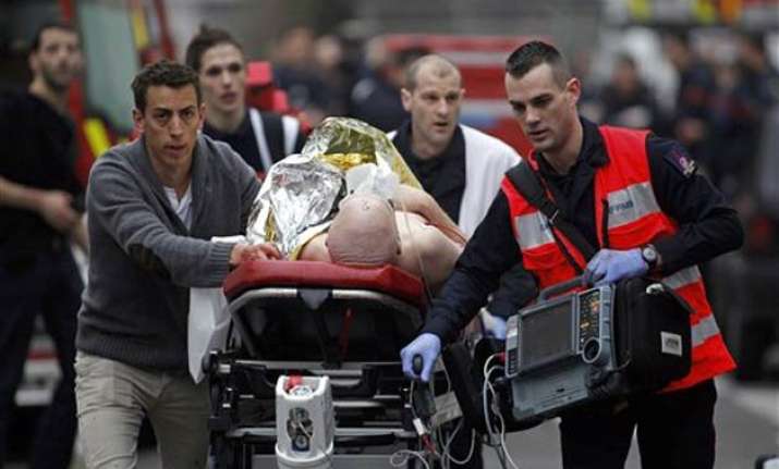 12 dead in attack on paris newspaper including the editor