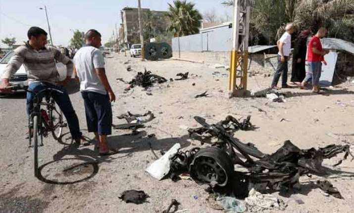 bombings kill 19 people in and around baghdad