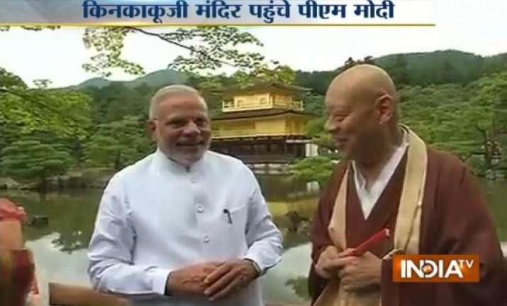 narendra modi greets buddhist head monk says i am modi you