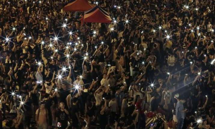 hong kong protesters stage massive defiant rally