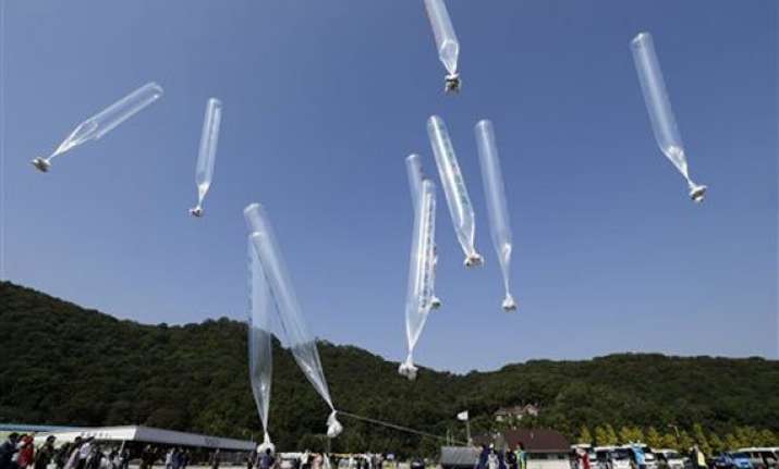 south korean activists vow to continue leafleting