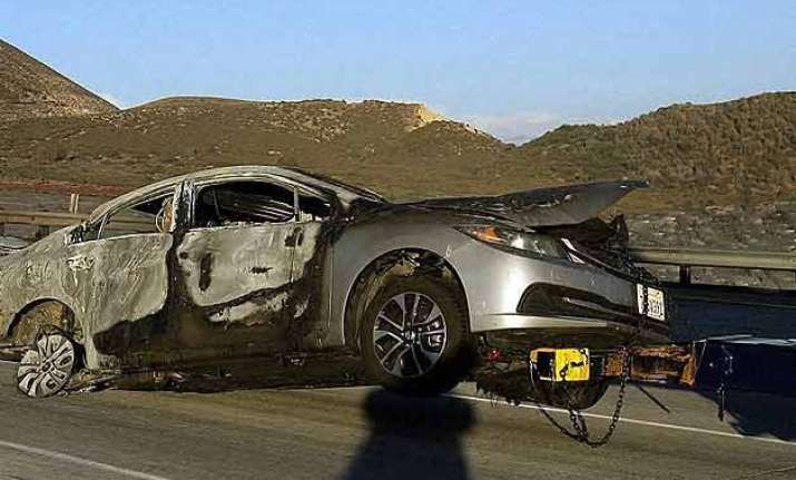 motorists flee as wildfire races across california freeway