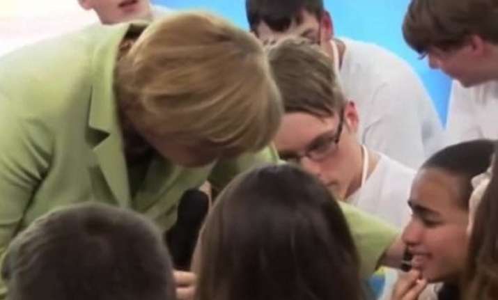 video angela merkel makes a little girl cry faces backlash