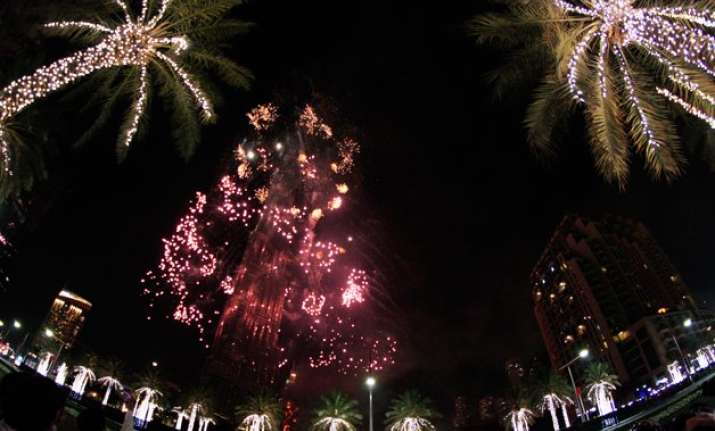 despite fears and huge dubai fire new year revelry rolls on